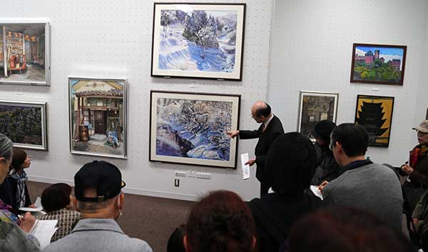 第65回記念光陽展・写真集・ギャラリートーク：会友秀作賞（工藤祐吉会友）の作品解説風景