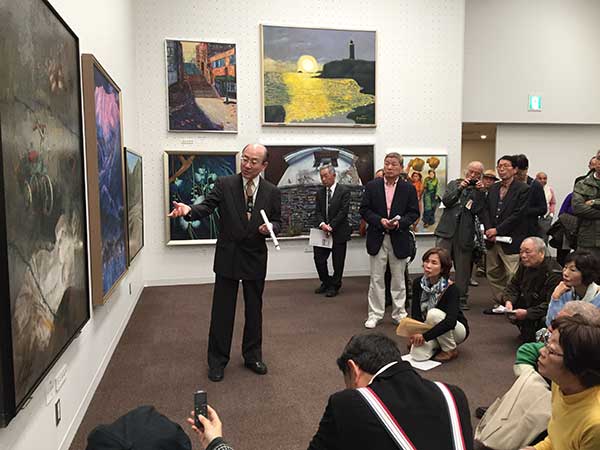 第65回記念光陽展・写真集・ギャラリートーク：会員奨励賞（小田柿寿郎会員）の作品解説風景